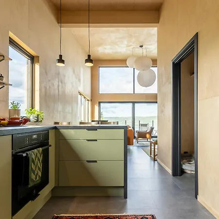 High Ceilings And Views Over The Inlet Flateby
